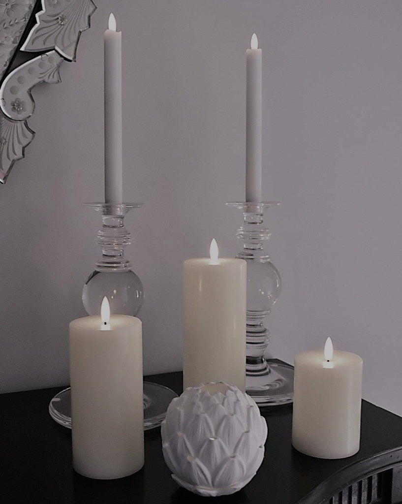 Set of 3 Ivory Flameless LED Candles on display